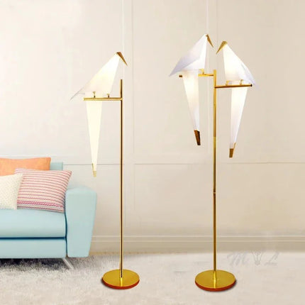 Lampadaire LED design oiseau en acier brossé, lumière chaleureuse d’intérieur - Luminous Place