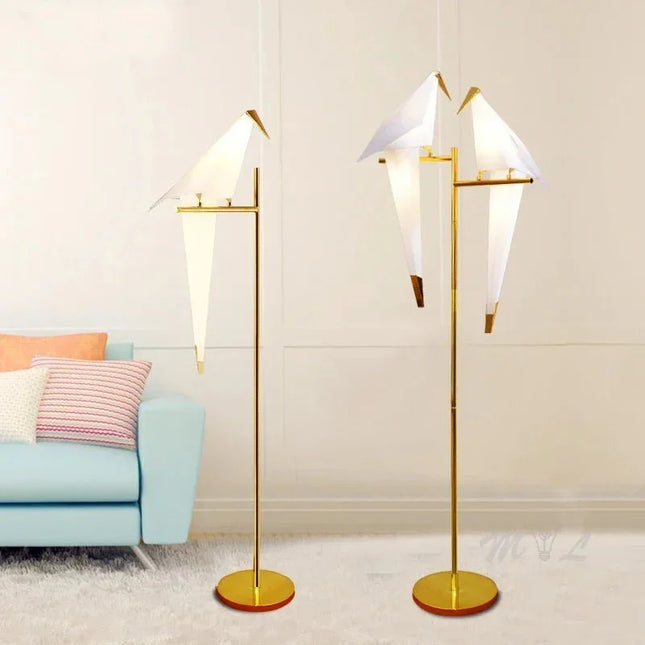Lampadaire LED design oiseau en acier brossé, lumière chaleureuse d’intérieur - Luminous Place