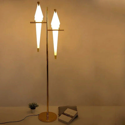 Lampadaire LED design oiseau en acier brossé, lumière chaleureuse d’intérieur - Luminous Place