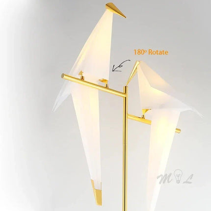 Lampadaire LED design oiseau en acier brossé, lumière chaleureuse d’intérieur - Luminous Place