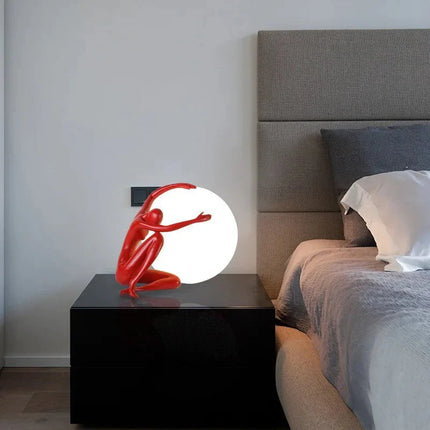 Lampe de table design sculpture humaine avec lumière décorative boule, ambiance cosy pour salon et bureau - Luminous Place