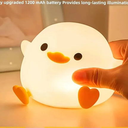 Lampe Enfant LED rechargeable en silicone forme canard, tactile et variable, lumière douce - Luminous Place