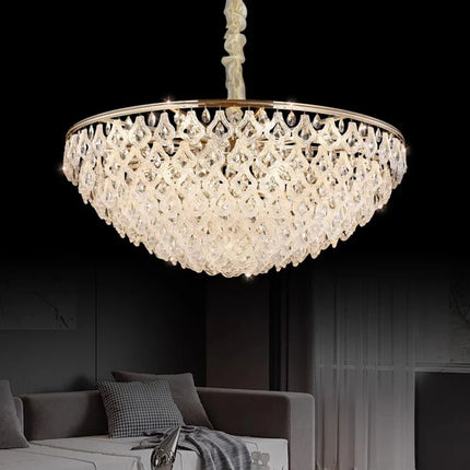 Lustre suspendu en cristal doré, design moderne, lumière chaleureuse pour salon et salle à manger