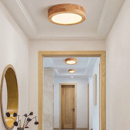 Plafonnier rond en bois LED style nordique pour ambiance chaleureuse