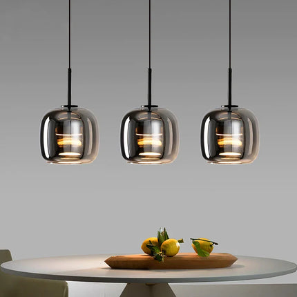 Suspension moderne en alliage et verre, lumière chaude pour salle à manger