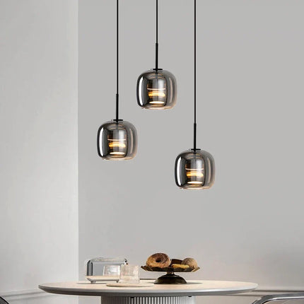 Suspension moderne en alliage et verre, lumière chaude pour salle à manger