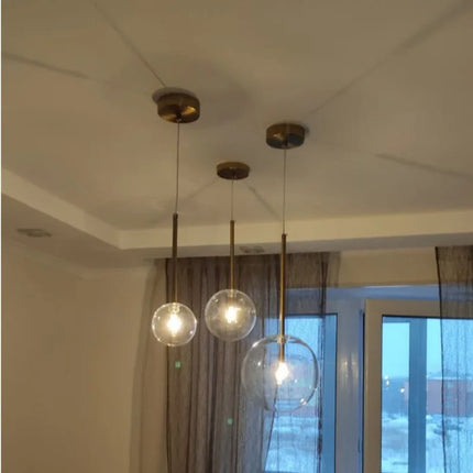 Suspension nordique en verre transparent, luminaire suspendu design pour intérieur contemporain