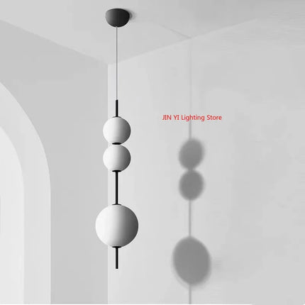 Suspension lustre verre blanc LED 4 têtes boule ronde design moderne