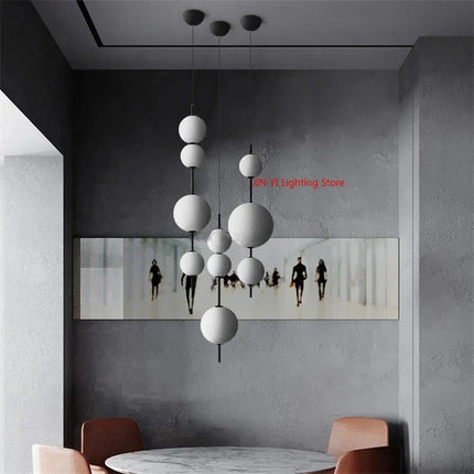 Suspension lustre verre blanc LED 4 têtes boule ronde design moderne