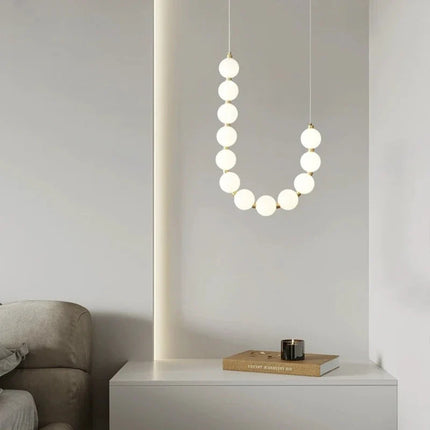 Suspension lampe perle haricot LED moderne en acrylique pour salon et escalier