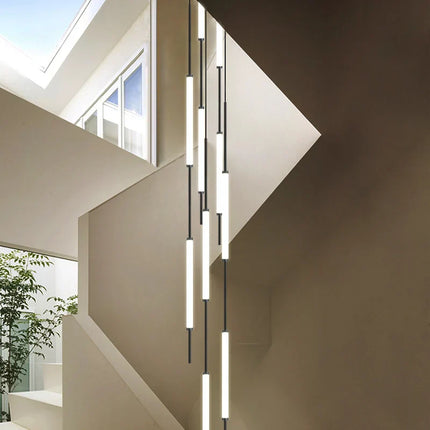 Suspension LED dorée et noire design moderne pour salon et escalier