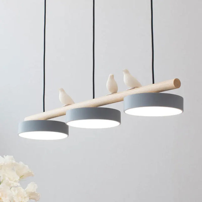 Suspension LED nordique minimaliste en fer et résine oiseau pour salle à manger