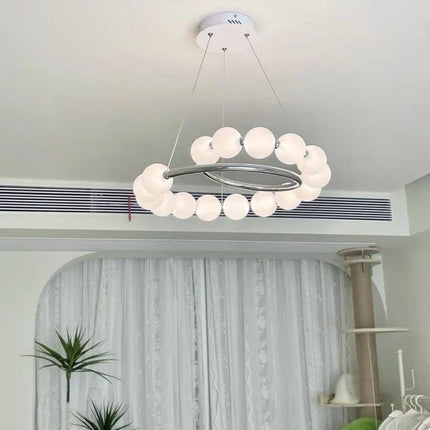 Suspension LED ronde en verre moderne pour intérieur luxe et ambiance chaleureuse