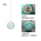 Oeuf vert bleu clair / D16,5 cm / Lumière chaude