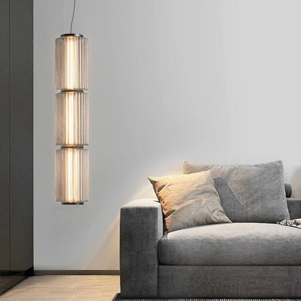 Suspension LED en verre gris et métal doré, design nordique lumineux
