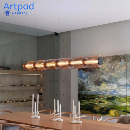 Suspension LED design italien en verre gris fumé, lumière chaude ambiance cosy